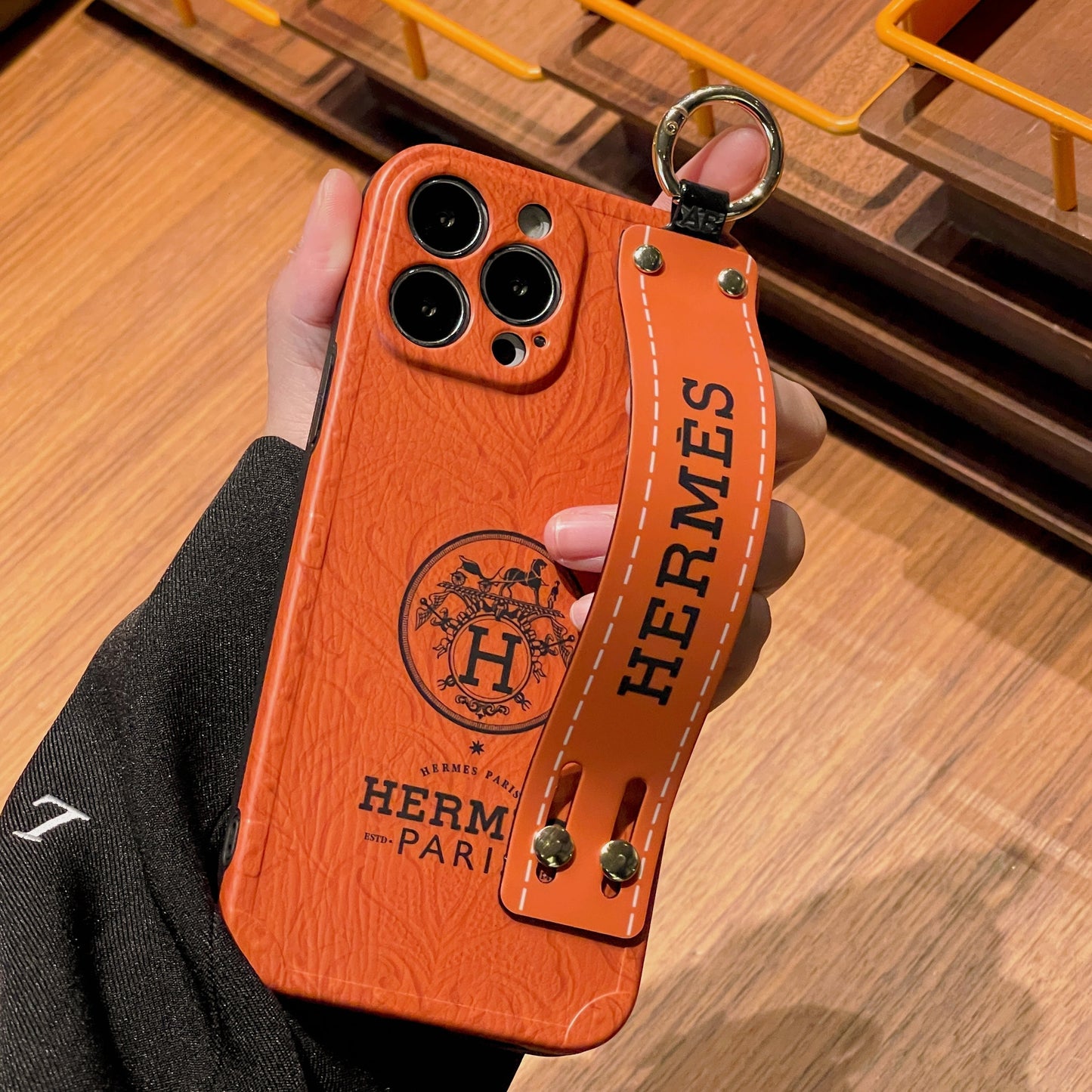 Custodia per iPhone con cinturino H
