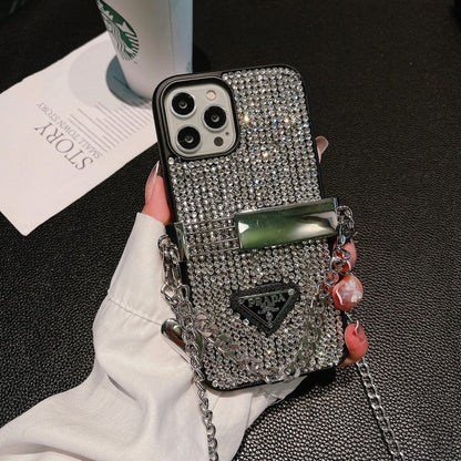 Custodia per iPhone di lusso con catena a tracolla con diamanti