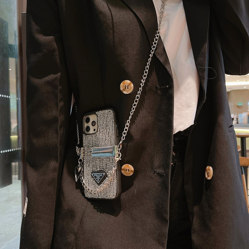 Custodia per iPhone di lusso con catena a tracolla con diamanti