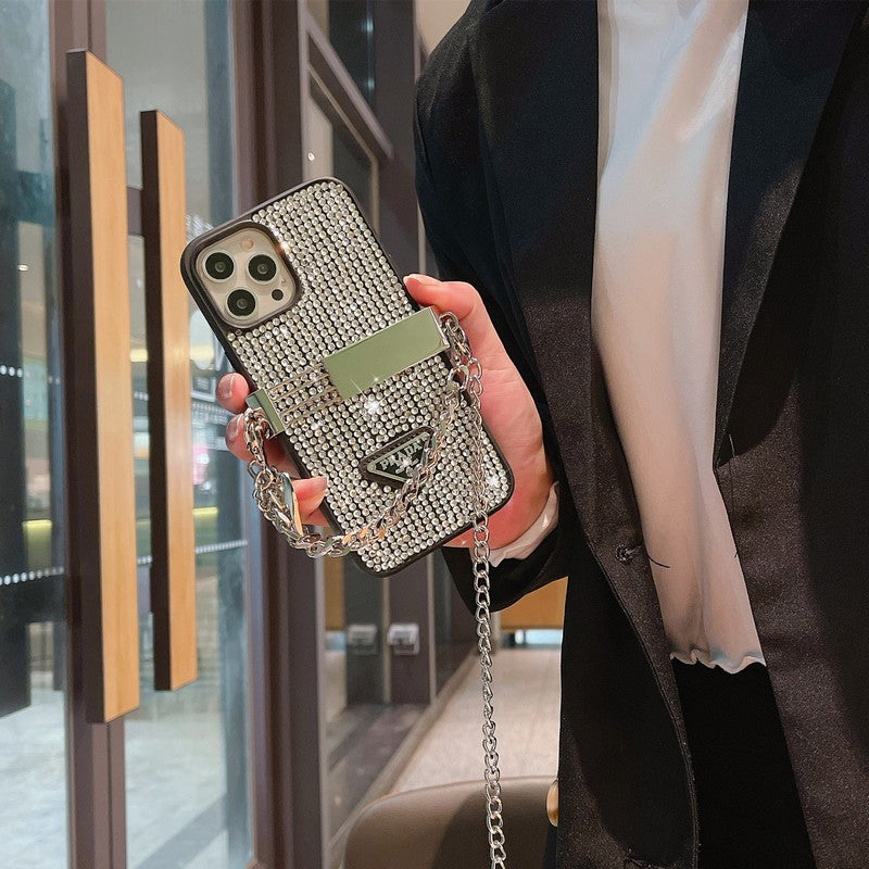 Custodia per iPhone di lusso con catena a tracolla con diamanti