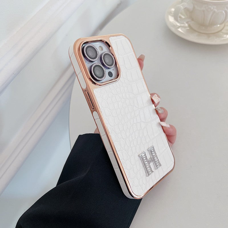 Klasické pouzdro na iPhone z růžového zlata s diamantovým logem